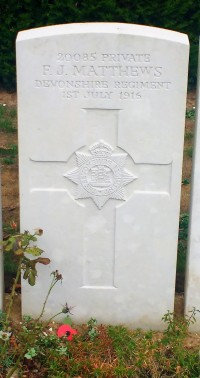 Headstone of Private F. J. Matthews, Devonshire Regiment, 1st July 1916.